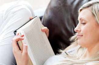 Woman reading Keratoconus after corrective eye surgery